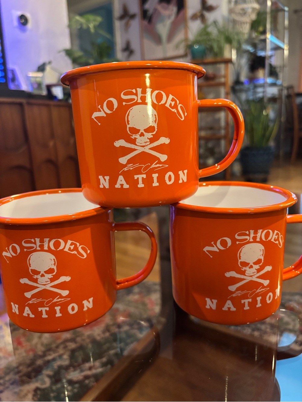 3 Kenny Chesney "No Shoes Nation" orange enamel campfire mugs.